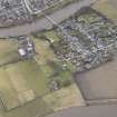 Oblique aerial view centred on the remains of the Abbey of Cambuskenneth, looking to the NNW.