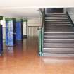 Interior. View of West stair case on mezzanine level.