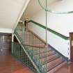 Interior. View first floor staircase.