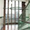 Interior. View first floor staircase, looking toward east tower.