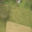 Oblique aerial view of the parchmarks of the possible enclosure, looking NNW.