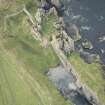 Oblique aerial view of Castle Sinclair and Castle Girinigoe, looking WSW.