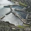 Oblique aerial view of Wick Harbour and Wick Harbour Bridge, looking SE.