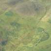 Oblique aerial view of Achnacarnin Township, looking E.