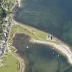 Oblique aerial view of Lochranza Castle and fish trap, looking to the NW.
