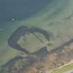 Oblique aerial view of the remains of the harbour, looking to the SSE.