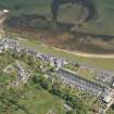 General oblique aerial view of the Hamilton Terrace area of Lamlash with the remains of the harbour adjacent, looking to the E.