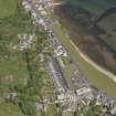 General oblique aerial view of the Hamilton Terrace area of Lamlash with the remains of the harbour adjacent bay, looking to the ENE.