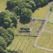 Oblique aerial view of Kilbride Chapel and churchyard, looking to the S.