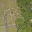 Oblique aerial view of Kilbride Chapel and churchyard, looking to the N.