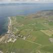 General oblique aerial view of the south west coast of Arran with Shiskine in the foreground, looking to the NW.