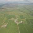 General oblique aerial view of the field systems around the village of Sliddery, looking to the N.