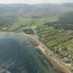 General oblique aerial view of Lamlash Bay centred on the fish trap, looking to the NW.