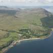 General oblique aerial view of Millstone Point with Corrie Golf Course in the foreground, looking to the NW.