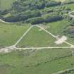 Oblique aerial view of the tank firing track and explosives testing area at Howwell, looking NW.