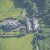 Oblique aerial view of Arbigland House and stable block, looking to the SW.