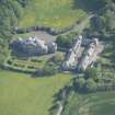 Oblique aerial view of Arbigland House and stable block, looking to the S.