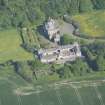 Oblique aerial view of Arbigland House and stable block, looking to the SE.