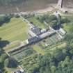 Oblique aerial view of Tongue House and walled garden, looking to the NW.