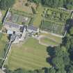 Oblique aerial view of Tongue House and walled garden, looking to the E.