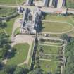 Oblique aerial view of Sandside House and walled garden, looking to the NW.