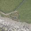 Oblique aerial view of Brims Ness burial ground, looking to the SE.