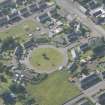 Oblique aerial view of Sinclair Square, Halkirk, looking to the SE.