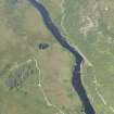 Oblique aerial view of Hope Bridge, possible hut circles and the weirs, looking to the N.