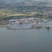 Oblique aerial view of the dockyard at Rosyth, looking NNE.