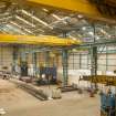 Interior. Central Yard, Steel preparation workshop, North Bay. General view from North West showing Hugh Smith 600 Ton rolling machine (left) and vertical press.