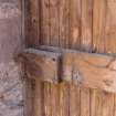 Detail of wooden lock on interior of central door at ground-floor level in the north wall from a Standing Building Survey, Glamis Mill, Glamis, Angus.