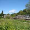 View of associated buildings from the south west, from a Standing Building Survey, Glamis Mill, Glamis, Angus.