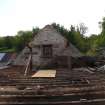 View of the south gable at first floor level with the launder adjacent to the waterwheel, from a Standing Building Survey, Glamis Mill, Glamis, Angus.