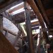 View of the drum of the waterwheel and its wooden bucket floats, from a Standing Building Survey, Glamis Mill, Glamis, Angus.