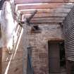 View of the door into the sawmill and the drive slot in the south gable, from a Standing Building Survey, Glamis Mill, Glamis, Angus.