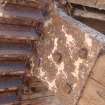 Detail of the waterwheel showing a timber spoke, metal shoe and rim drive, from a Standing Building Survey, Glamis Mill, Glamis, Angus.