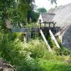 Exterior view of out-building and sluice, from a Standing Building Survey, Glamis Mill, Glamis, Angus.