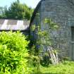 Exterior view of the mill showing an out-building to the rear, from a Standing Building Survey, Glamis Mill, Glamis, Angus.