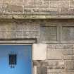 Detail of inscribed lintel above entrance to Nisbet of Dirleton's House, 82-84 Canongate, Edinburgh.