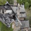 Elevated view from crane, looking down onto fire damaged building.