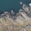 Oblique aerial view of Vaul, Dun Beag, Tiree, looking N.