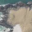 Oblique aerial view of Dun Hanais, Tiree, looking WNW.