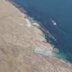 Oblique aerial view of Port Ban, Tiree, looking NE.