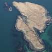 Oblique aerial view of Fladda, Treshnish Isles, looking NE.