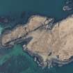 Oblique aerial view of Fladda, Treshnish Isles, looking NW.