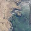 Oblique aerial view of Dun Ban, Ulva, looking SSW.