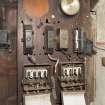 Interior. Detail of electrical switchboard in control room.
