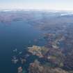 General oblique aerial view of Eddrachillis Bay centred on Eilean an Achaidh and the site of the Drumbeg wreck with Quinag beyond, looking E.