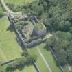 Oblique aerial view of Pitsligo Castle, looking ESE.