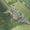 Oblique aerial view of Pitsligo Castle, looking NW.